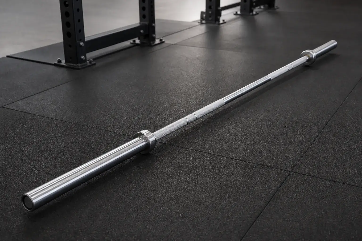 Unbranded commercial Olympic barbell on a neutral lifting platform